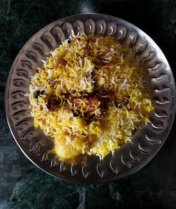 Biryani cooked in Kolkata style in a pressure cooker