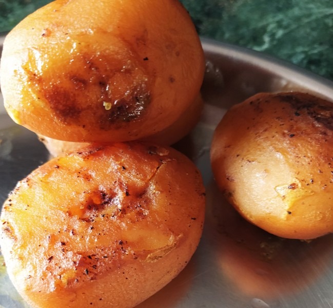 Brown Colored Potatoes for Biryani cooked in Pressure Cooker